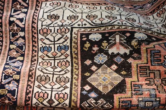 A Persian ivory ground runner, 13ft 2in by 4ft 4in.